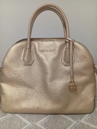 Bolso Michael Kors Dorado Costó 325€