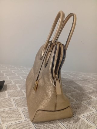 Bolso Michael Kors Dorado Costó 325€