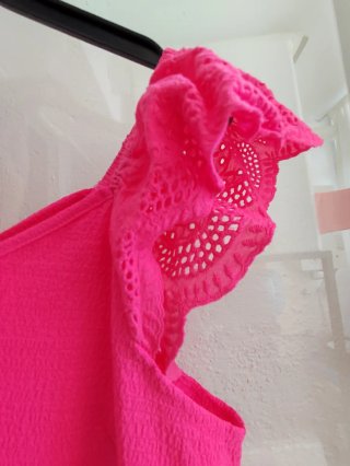 Blusa fucsia con volantes S/M