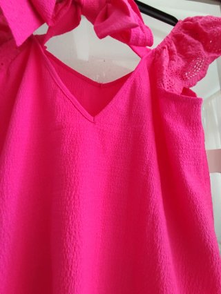 Blusa fucsia con volantes S/M