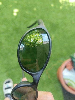 Gafas de sol Ray-Ban negras y verdes