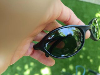 Gafas de sol Ray-Ban negras y verdes