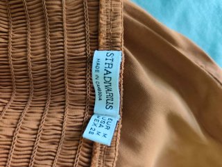 Mono mujer espalda descubierta naranja