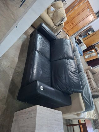 Sofá de piel negro ocasión