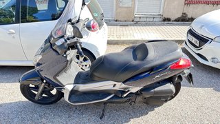 Yamaha XMAX 125  Averiada para reparar o piezas.