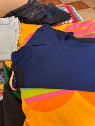 Camiseta Nike deportiva azul naranja T. 10-12 años