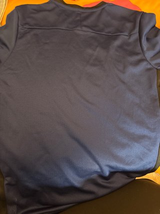 Camiseta Nike deportiva azul naranja T. 10-12 años