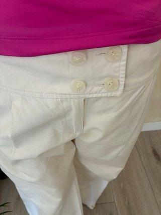 Conjunto top fucsia y pantalón blanco