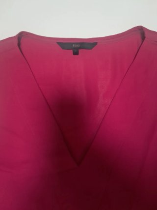 Blusa fucsia sin mangas