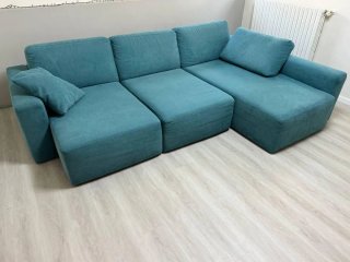 Divano angolare blu in tessuto