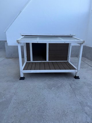 Caseta para perros con porche