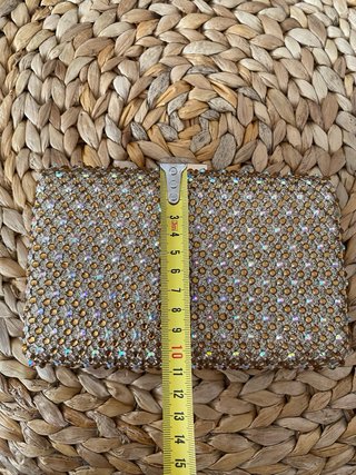Bolso de fiesta dorado con pedrería