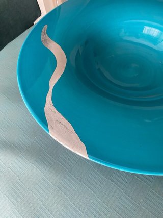 Centro de mesa porcelana turquesa y plata.