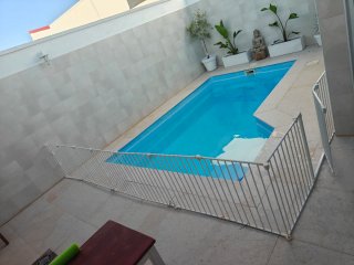 Vaya de protección con puerta