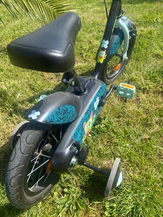 Bicicleta infantile Btwin con ruote stabilizzatrici
