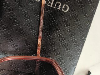 Gafas de sol Guess doradas y rosas