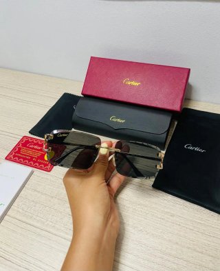 Gafas Cartier Negras con montura dorada Doradas