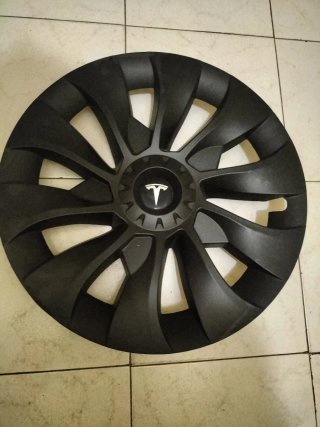 Tapacubos Tesla Negros