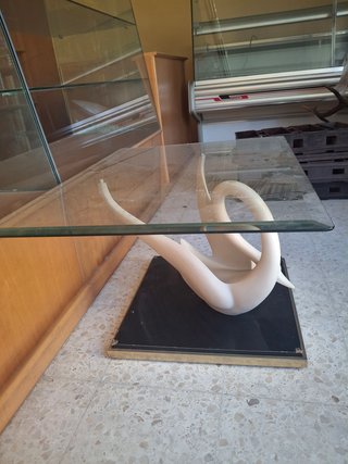 Mesa de cristal con base de cisne