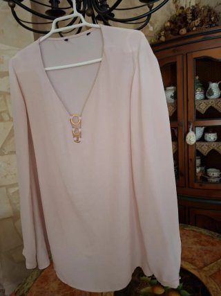 Camisola blanca con estampado floral