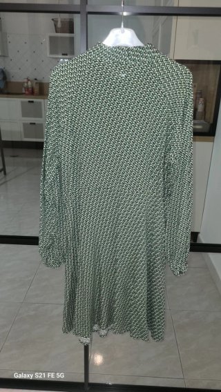 Vestito fantasia geometrica verde
