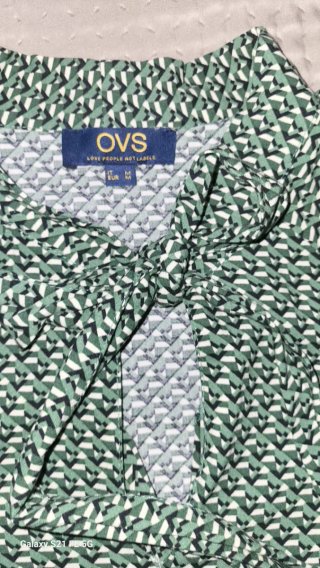 Vestito fantasia geometrica verde