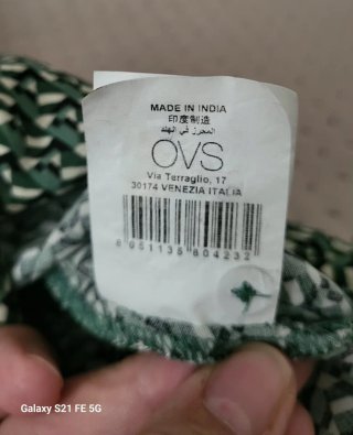 Vestito fantasia geometrica verde
