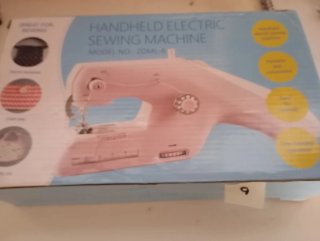 Máquina de coser eléctrica portátil