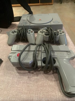 Console PS1 e PS2 con accessori