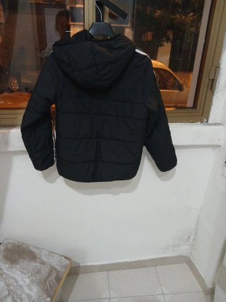 Giubbotto Adidas nero con strisce bianche