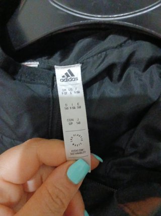 Giubbotto Adidas nero con strisce bianche