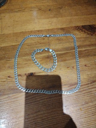 Cadena y pulsera de plata algo negociable