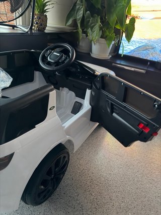 Coche eléctrico Land Rover Discovery para niños