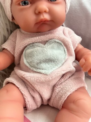 Muñeco bebé niña rosa con gorro gatito