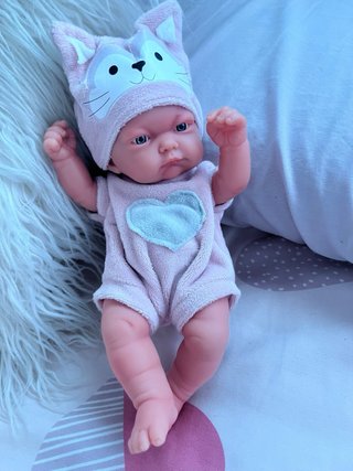 Muñeco bebé niña rosa con gorro gatito