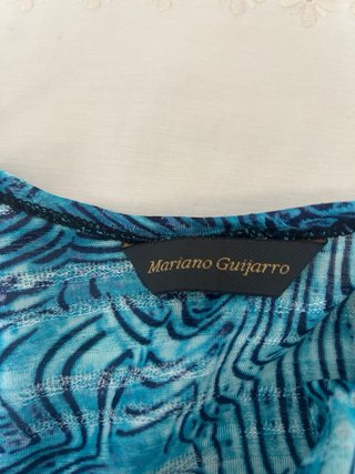 Blusa azul y negro talla 50 valia40 euros española