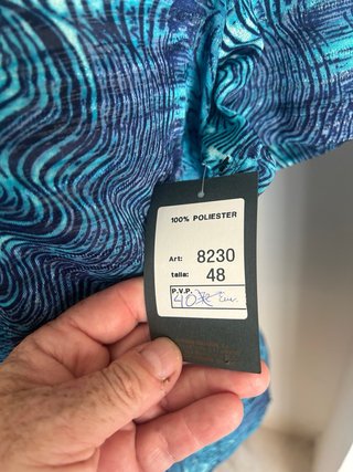 Blusa azul y negro talla 50 valia40 euros española