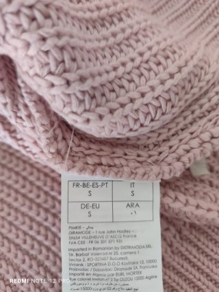 Jersey rosa tejido con detalles