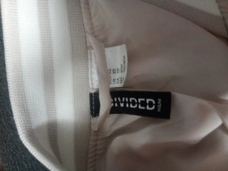 Cazadora H&M entretiempo beige y blanco
