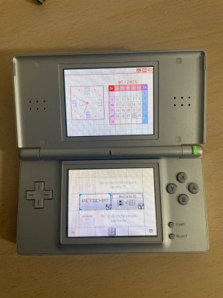 Nintendo DS Lite Plata con Cargador y Juego