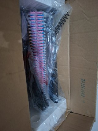 Máquina para anillar cuadernos