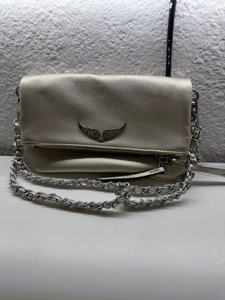 Bolso de mano dorado y plateado