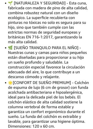 Cuna de bebé blanca con cajón