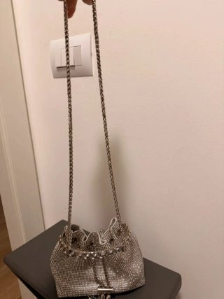 Bolso de fiesta plateado con pedrería