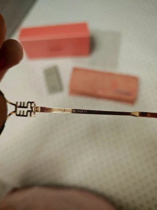 Gafas de sol Miu Miu Marrón y Dorado