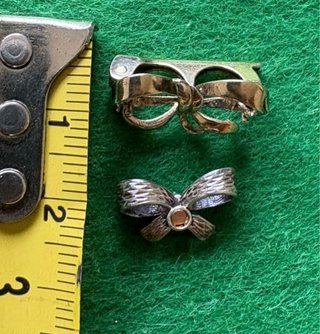 Broche y colgante lazo plata ley
