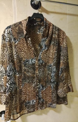 Blusa estampada animal print Marca