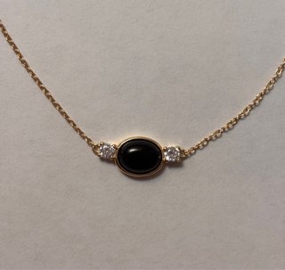 Colgante ónix negro plata bañada en oro