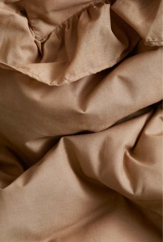 Funda nórdica H&M con volante beige