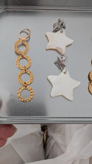 Pendientes estrella y aros dorados